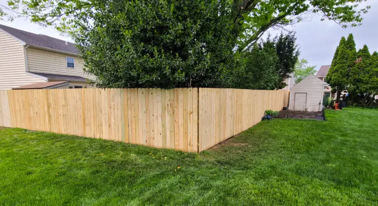 A professionally installed fence in Bucks County, PA, showcasing Artisan Outdoor Contractors’ quality fence installation services.