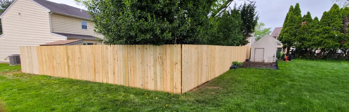 A professionally installed fence in Bucks County, PA, showcasing Artisan Outdoor Contractors’ quality fence installation services.